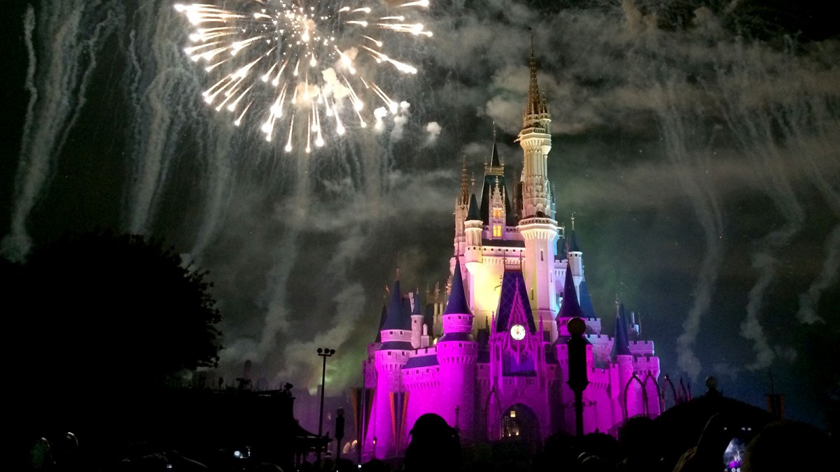 cinderella castle with fireworks at night