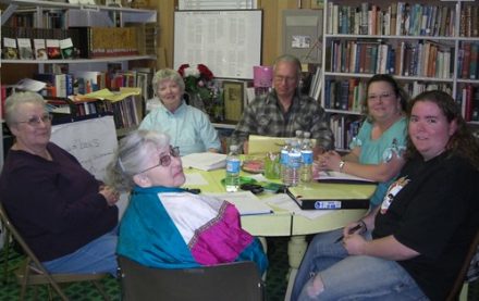 people sitting around a table for a focus group